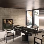 Luxury Black Marble Oval Dining Table with Sleek Geometric Base