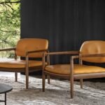 Sculpted Walnut Frame and Plush Channeled Cushioning Armchair with Footrest
