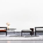 Sculpted Walnut Frame and Plush Channeled Cushioning Armchair with Footrest