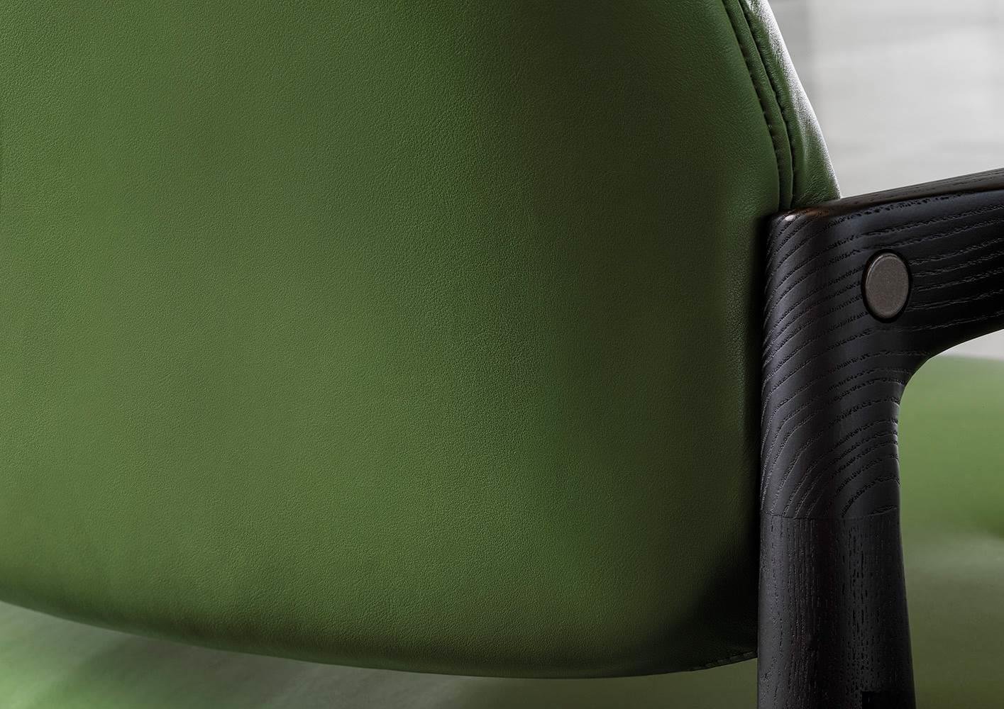 Sculpted Walnut Frame and Plush Channeled Cushioning Armchair with Footrest