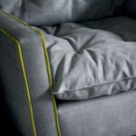 Light Gray Modern Swivel Armchair with Tufted Cushion & Decorative Stitching