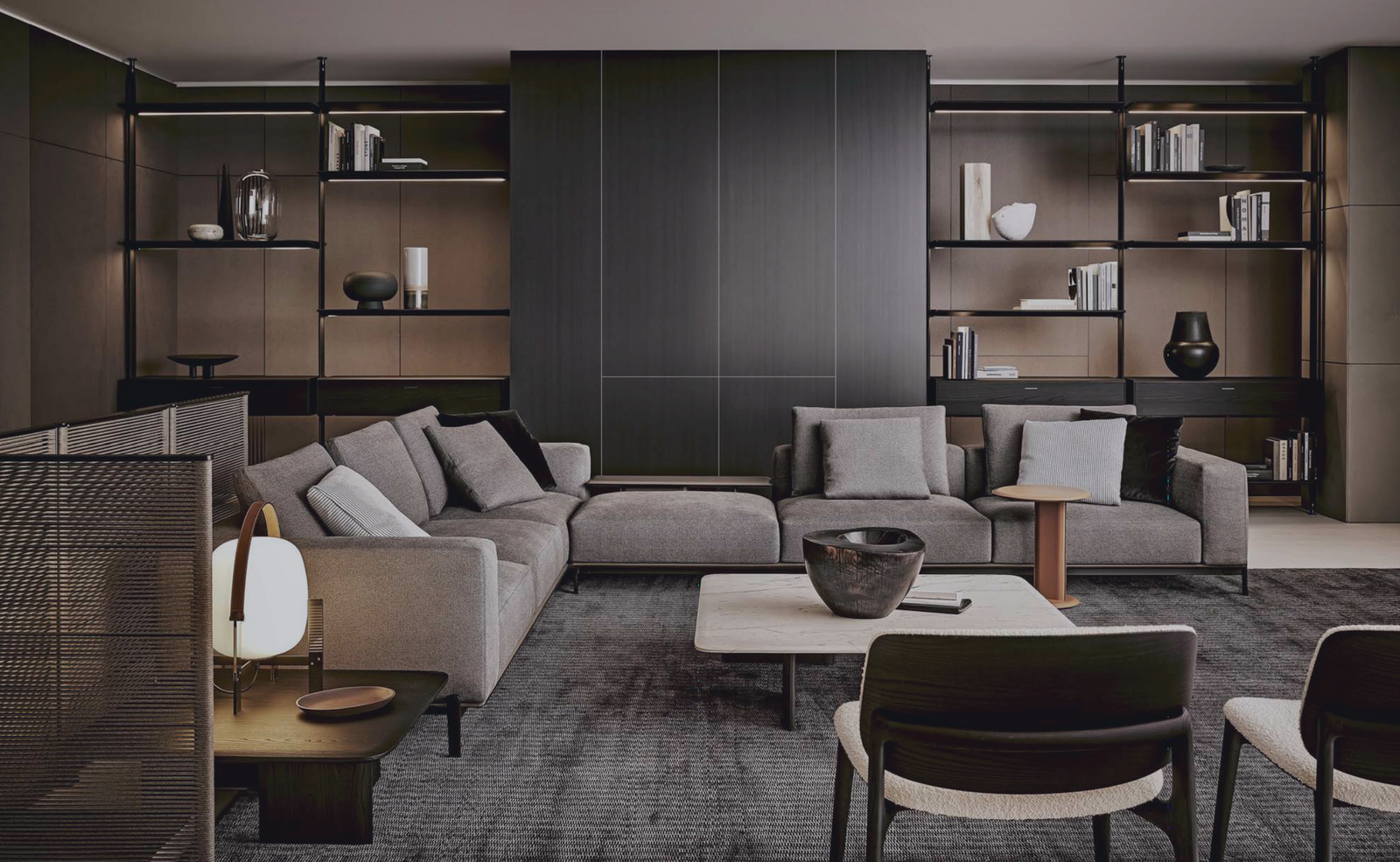 Sculptural Curved Sofa with Leather-Wrapped Base and Contrast Stitch Detailing