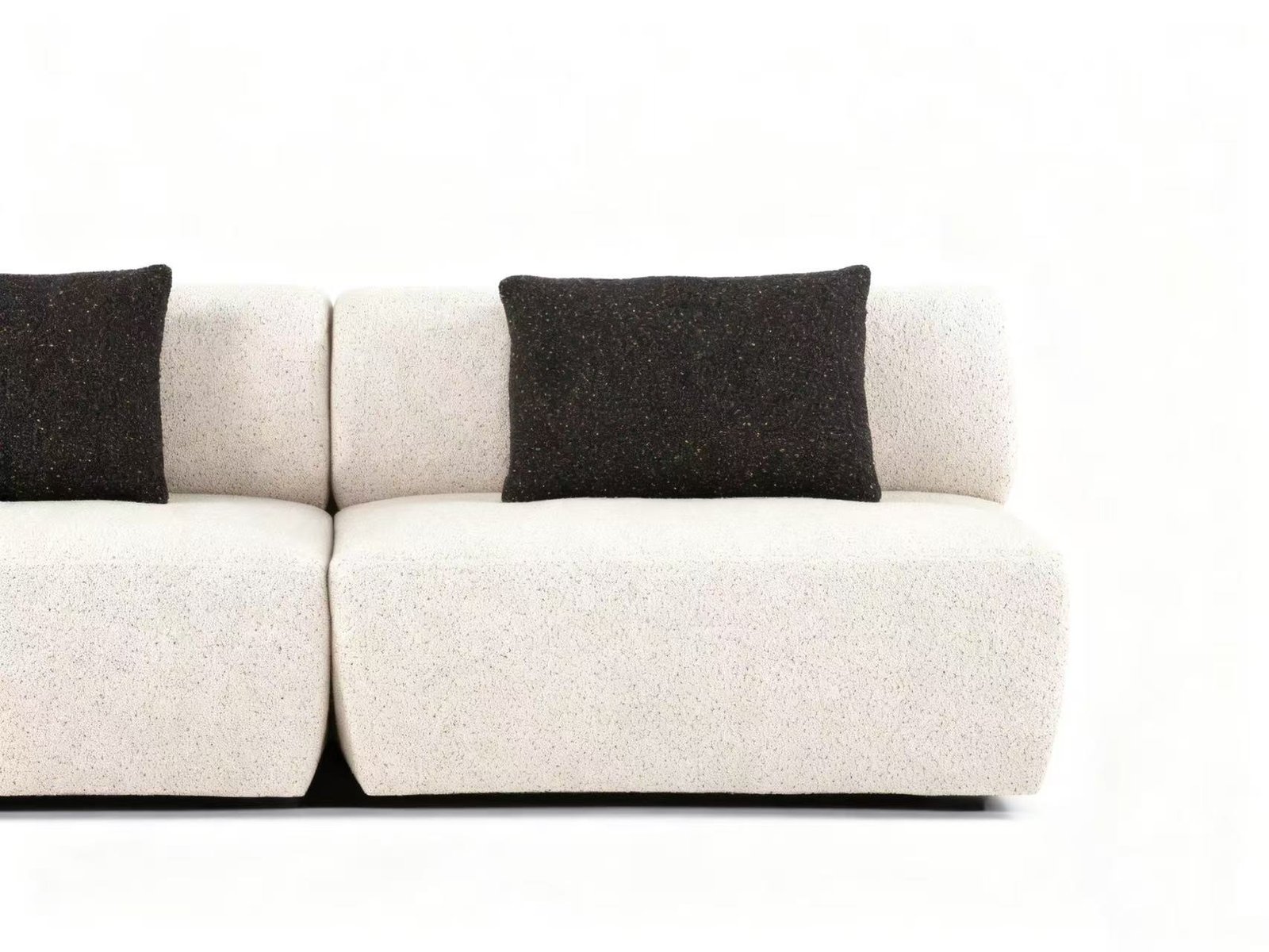 Flowing Modular Sofa with Ergonomic Support and Continuous Decorative Stitch