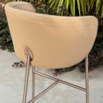 Beige Upholstered Bar Stool with Brushed Metal Frame