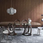 Round Glass Dining Table with Intertwined Wood Legs and Chrome Base