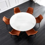 Round White Marble Dining Table with Sculpted Black Wood Base