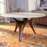 Round White Marble Dining Table with Sculpted Black Wood Base