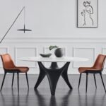 Round White Marble Dining Table with Sculpted Black Wood Base