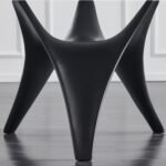 Round White Marble Dining Table with Sculpted Black Wood Base
