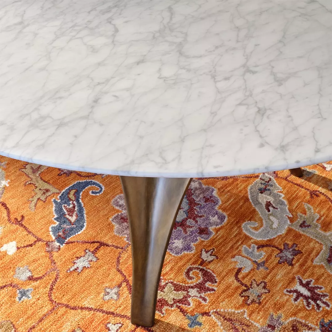 Round White Marble Dining Table with Sculpted Black Wood Base
