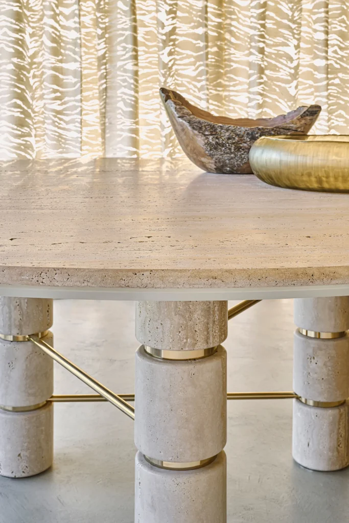 Travertine Round Dining Table with Stacked Cylindrical Legs