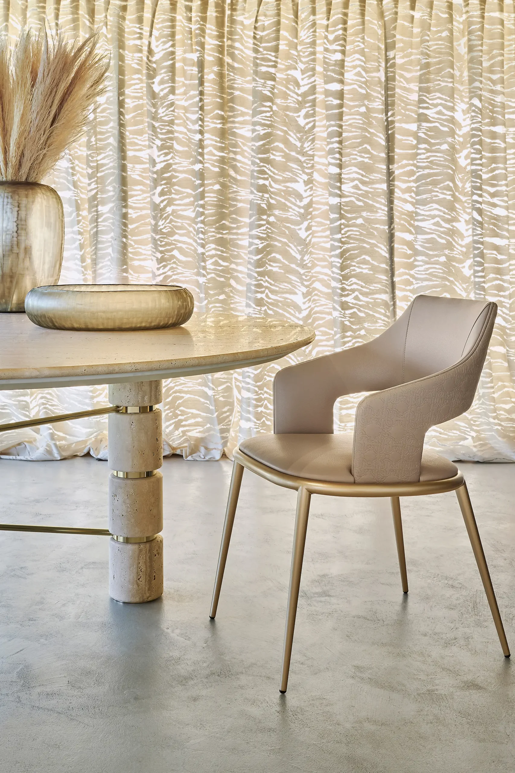 Travertine Round Dining Table with Stacked Cylindrical Legs