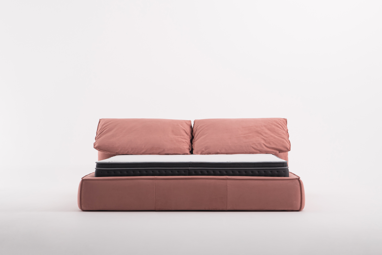 Blush Velvet Sofa Bed With Plush Pillows Multifunctional Modern Design