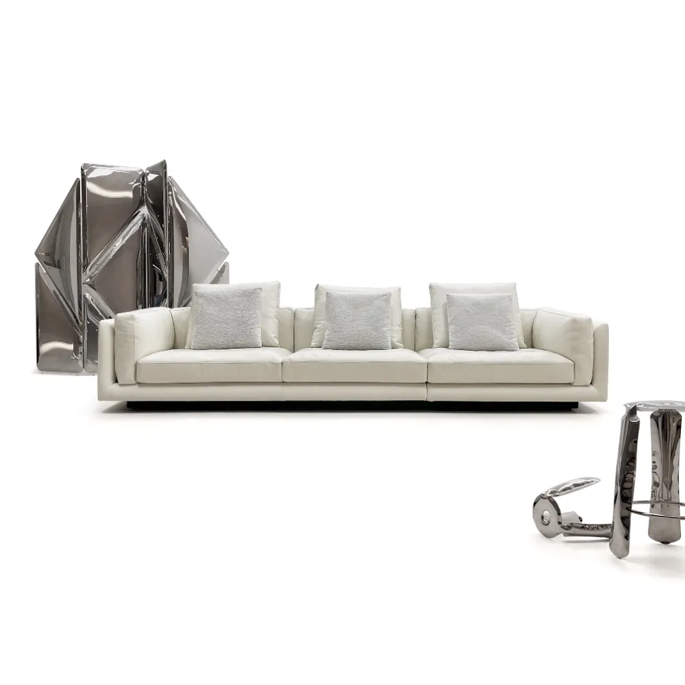 Beige Leather Four Seater Sofa with Metal Accents